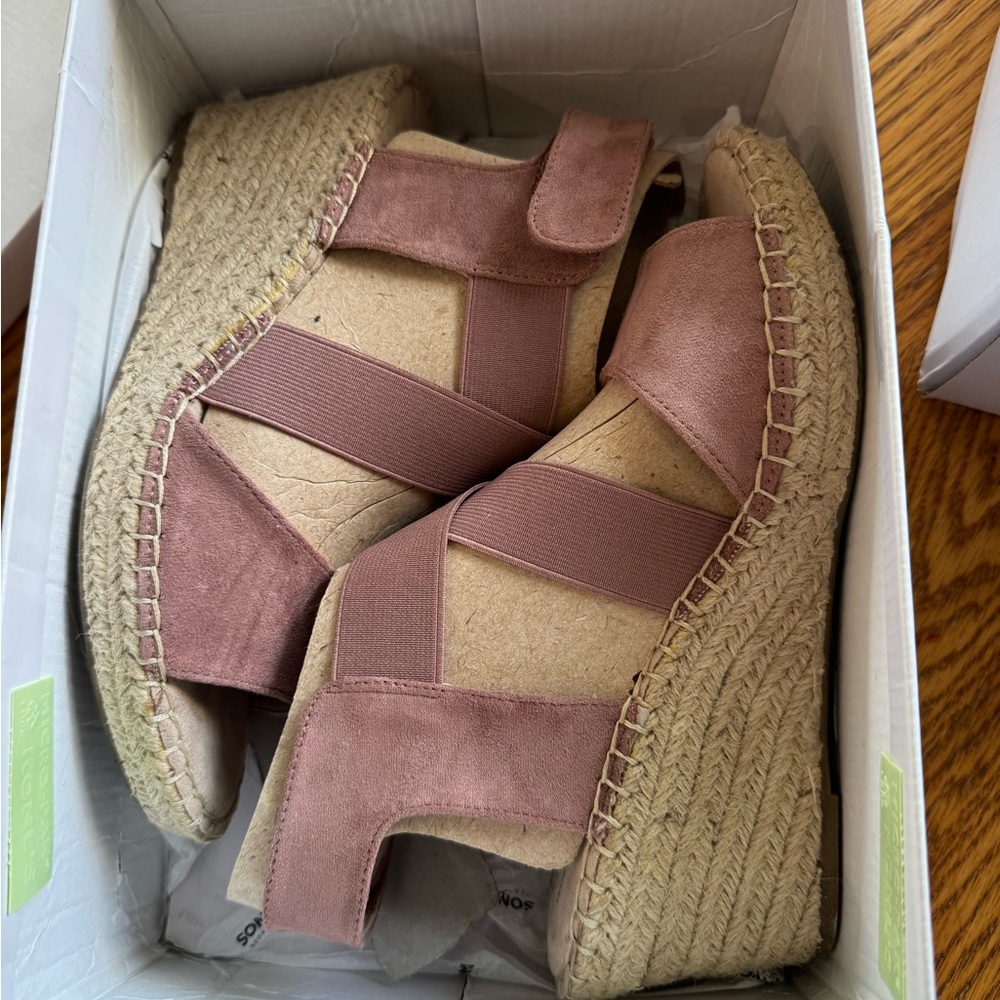 Brand new wedge sandals never worn. Originally $60
